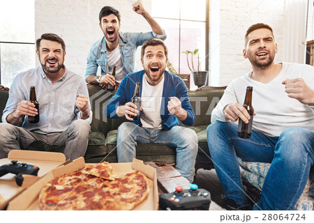 Happy jubilant men expressing their emotions 28064724