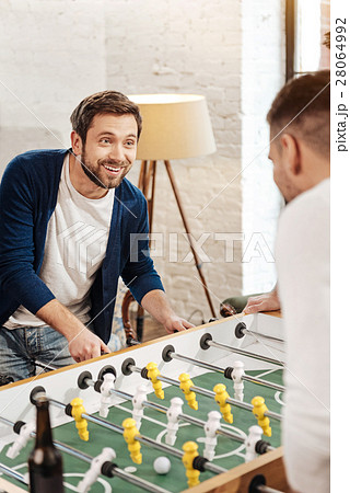 Cheerful joyful man looking at his opponent 28064992