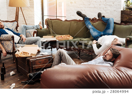 Tired bearded man resting after a bachelors party 28064994