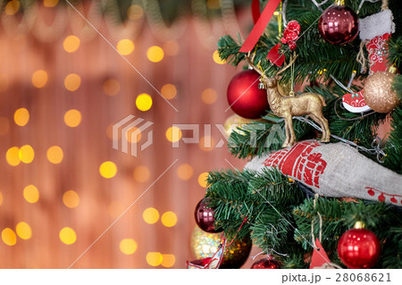 Christmas tree and bokeh light holiday background 28068621