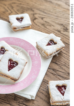 Pecan Cookies with Cherry Filling 28069951