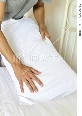 young man making the bed young man making the bed 28070643