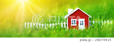 red wooden house on the grass red wooden house on the grass 28074914