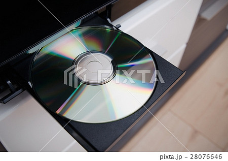 Blu-ray or DVD player with inserted disc Blu-ray or DVD player with inserted disc 28076646