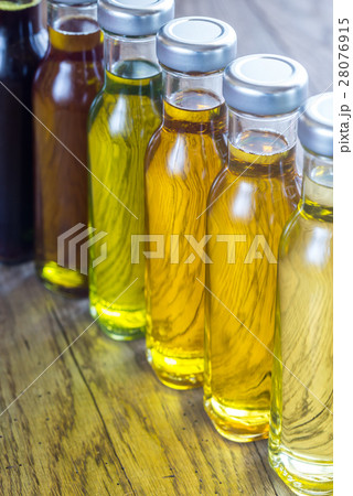 Bottles with different kinds of vegetable oil 28076915