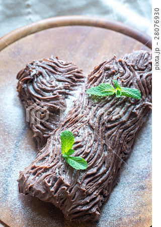 Yule log on the wooden board 28076930