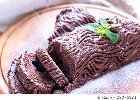 Yule log on the wooden board 28076931