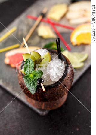 Coconut with ice and fresh fruits  28078811
