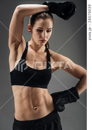 Young woman posing with boxing gloves 28079039
