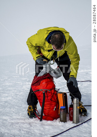 Men Hiking glacier Hvannadalshnukur summit in 28087464