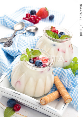Yogurt with berries. 28089946