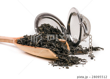 tea strainer with a wooden shovel isolated on tea strainer with a wooden shovel isolated on 28095512