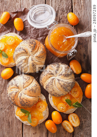 Sweet buns with kumquat jam and cream cheese 28097289