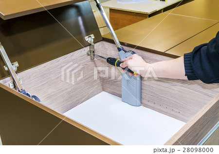 Assembling of furniture closeup 28098000