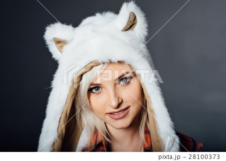 beautiful sexy girl wearing white fur hat 28100373