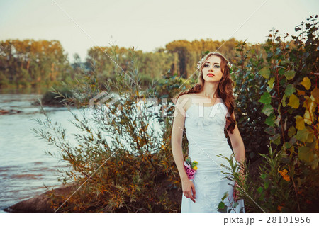 girl in white dress near the river 28101956