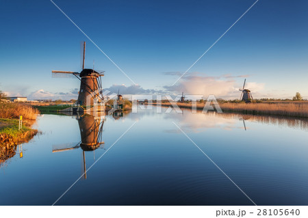 Rustic landscape with beautiful windmills 28105640