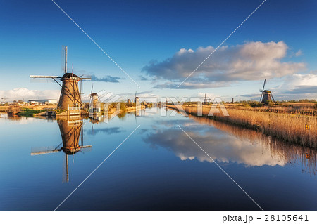 Rustic landscape with beautiful windmills 28105641