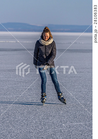 Young girl skating on Lake Balaton in Hungary 28106383