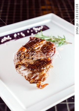 tasty steak with sauce tasty steak with sauce 28110168
