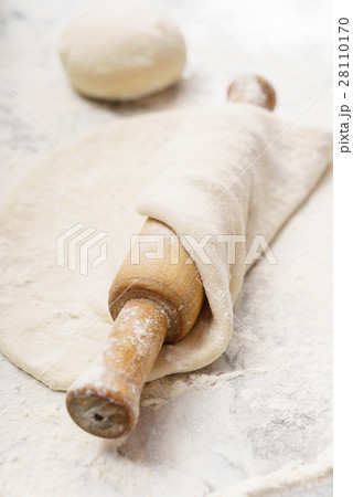 Fresh dough on a board Fresh dough on a board 28110170