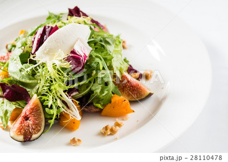 fresh salad with fig and persimmon 28110478