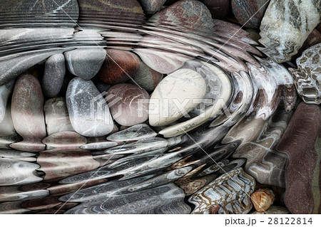 Water ripples over the stone pebbles Water ripples over the stone pebbles 28122814