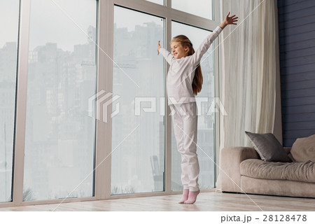 Happy child waking up at home 28128478