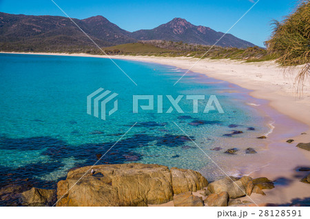 Crystal-clear waters of Wineglass Bay beach Crystal-clear waters of Wineglass Bay beach 28128591