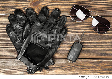 Car keys and driving gloves 28129849