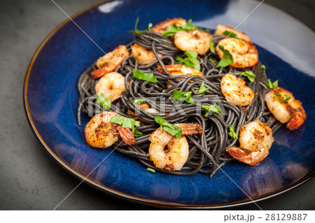 Black pasta with shrimps Black pasta with shrimps 28129887