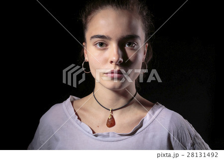 portrait of a beautiful woman with black background portrait of a beautiful woman with black background 28131492