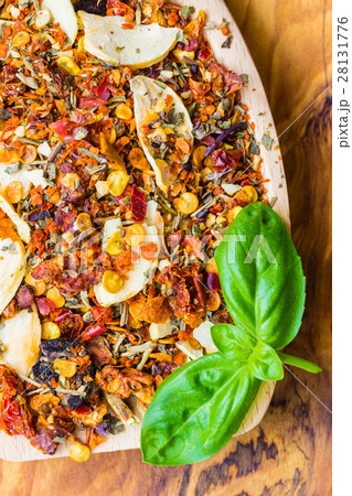 Colored spices for pasta mix on wooden spoon Colored spices for pasta mix on wooden spoon 28131776