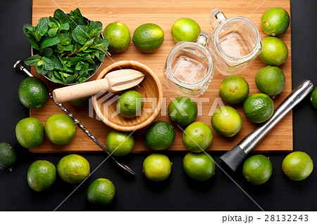 Lime is ready for juicing on a black table 28132243