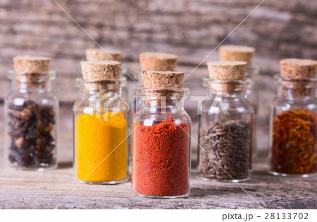 Spices in bottles Spices in bottles 28133702