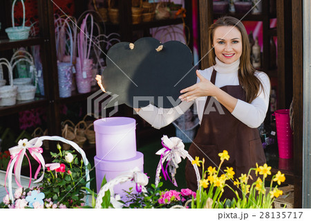 flower seller at floral store flower seller at floral store 28135717