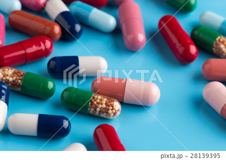 Different multicolored pills and medicine capsules Different multicolored pills and medicine capsules 28139395