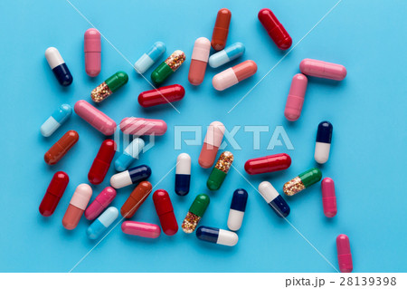 Different multicolored pills and medicine capsules 28139398