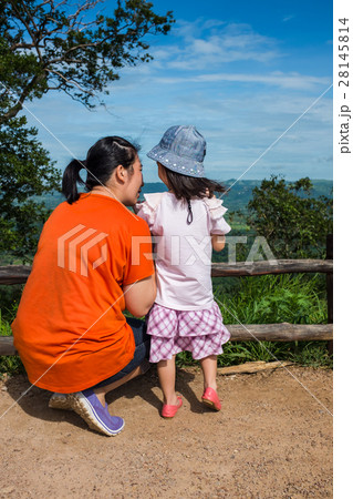 Happy family relaxing outdoors, travel on vacation Happy family relaxing outdoors, travel on vacation 28145814
