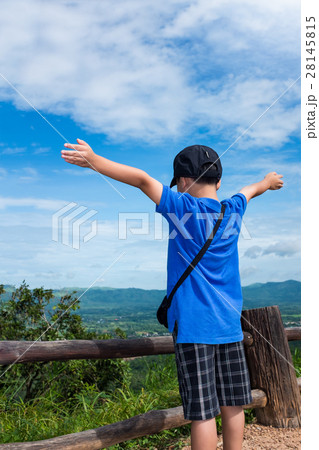 Happy child relaxing outdoors, travel on vacation Happy child relaxing outdoors, travel on vacation 28145815