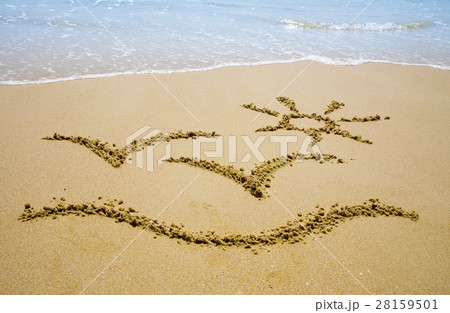 Sun pictured on the sand Sun pictured on the sand 28159501