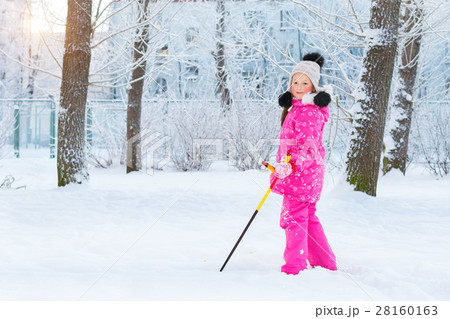 Girl is skiing in snow Park Girl is skiing in snow Park 28160163