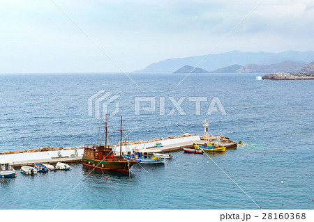 Harbour with vessels, boats and lighthouse, Crete Harbour with vessels, boats and lighthouse, Crete 28160368