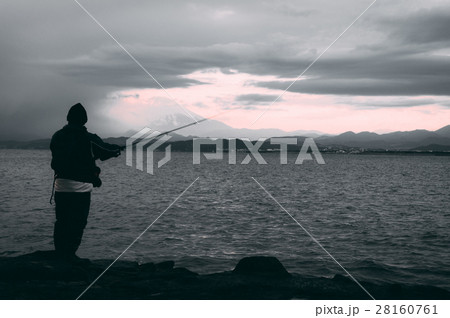 Silhouette of Fisherman at sunrise time Silhouette of Fisherman at sunrise time 28160761