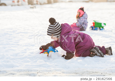 Children play on the snow Children play on the snow 28162566