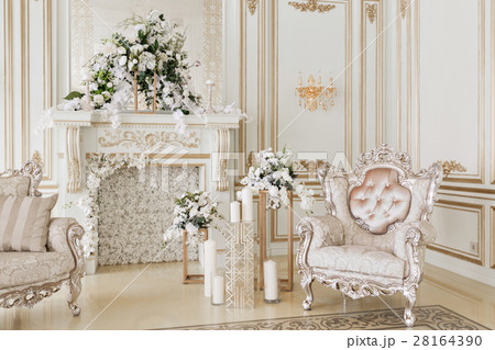 Luxurious vintage interior with fireplace in the 28164390