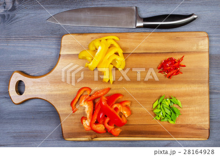 Wooden spoon and ingredients on dark background 28164928