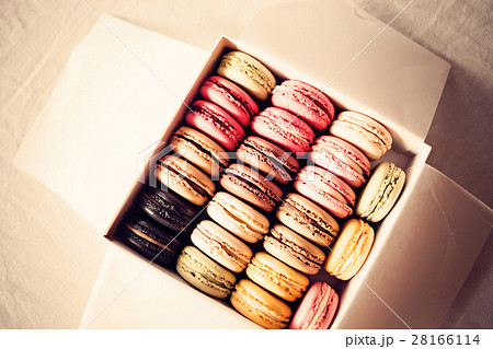 Vintage colorful french macarons in a box Vintage colorful french macarons in a box 28166114
