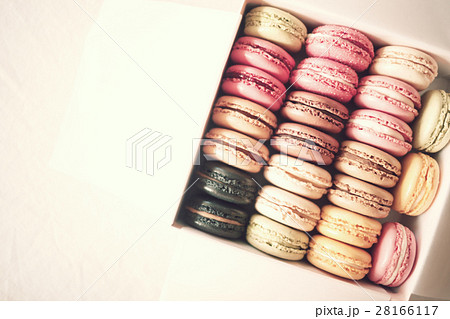 Vintage colorful french macarons in a box Vintage colorful french macarons in a box 28166117