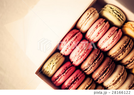 Vintage colorful french macarons in a box 28166122